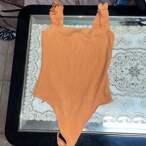 Aritzia Sunday Best orange sleeveless Firecracker thong bodysuit